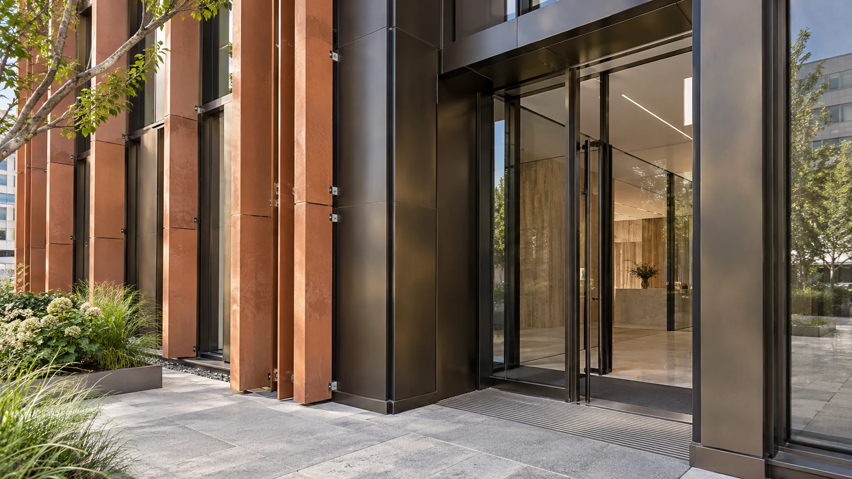 Commercial office entrance detail with bronze facade and glass doors — Architekturvisualisierung München